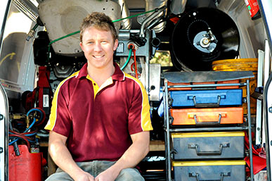 Reed is one of our Turlock plumbers and he is in his standing ready in his fully stoked truck